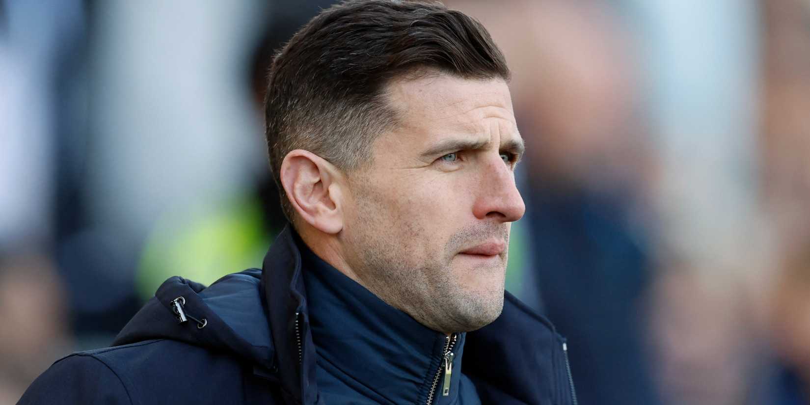 Portsmouth manager John Mousinho looks on