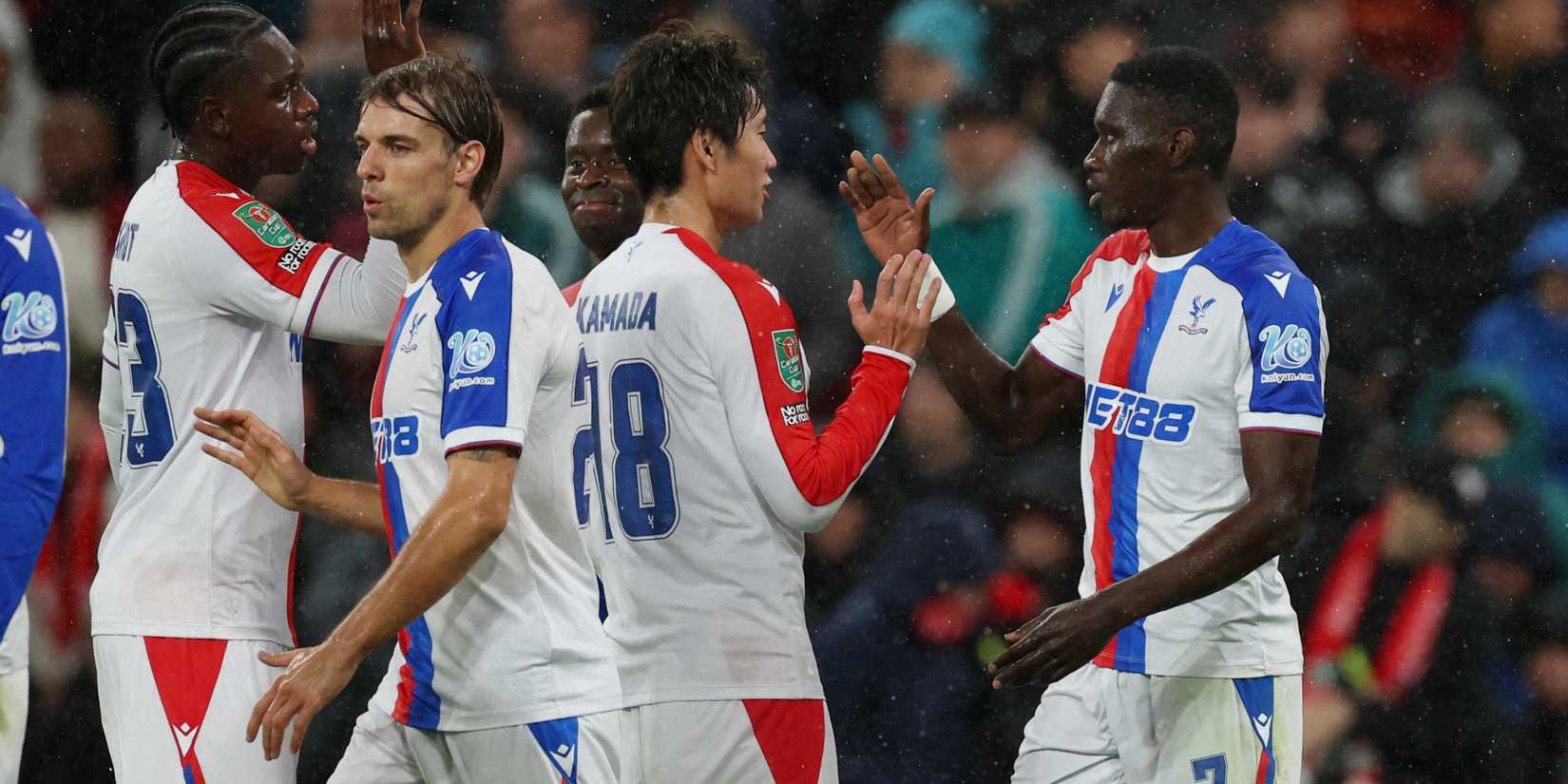 Crystal Palace players celebrating after scoring against Liverpool in the EFL Cup