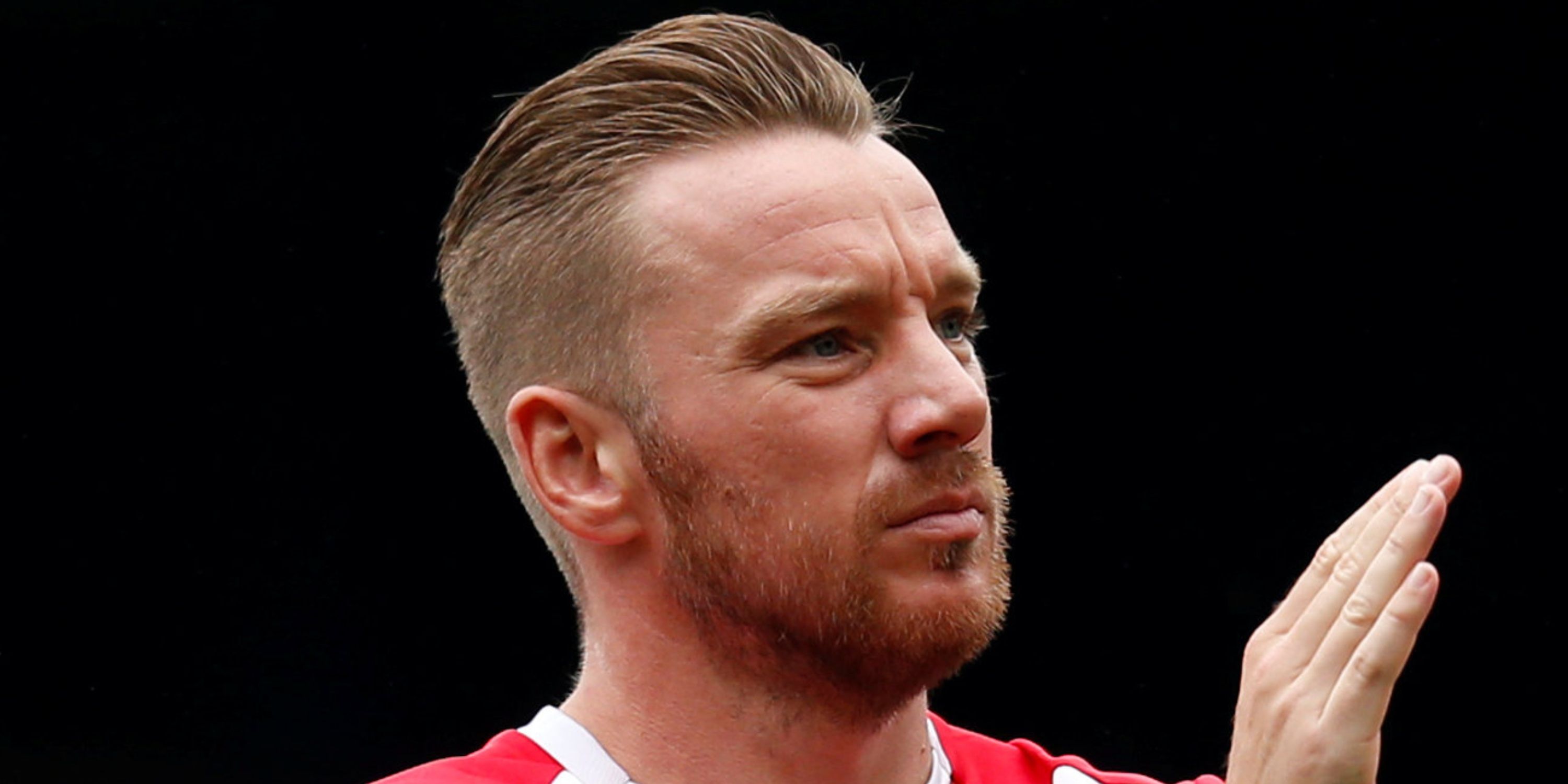 Jamie O'Hara applauds fans at Bradley Lowery Benefit Match