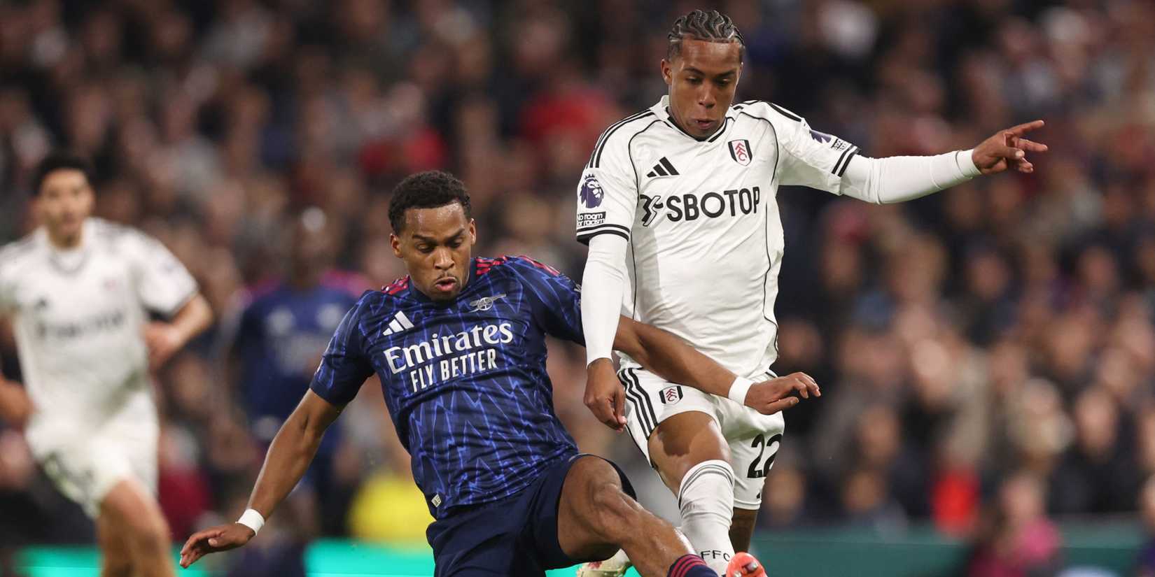 Arsenal's Jurrien Timber in action with Fulham's Kevin
