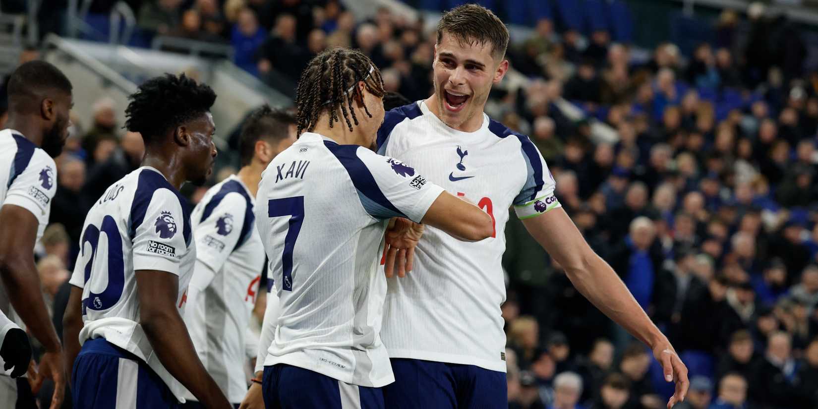 Tottenham players celebrating after scoring against Everton in the Premier League