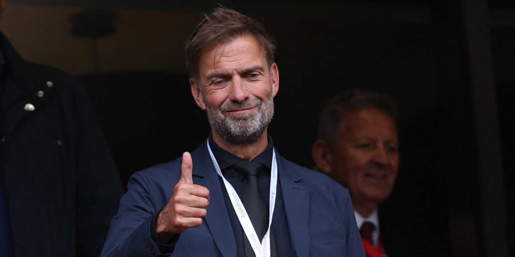 Jurgen Klopp gives a thumb up in the stands at Anfield