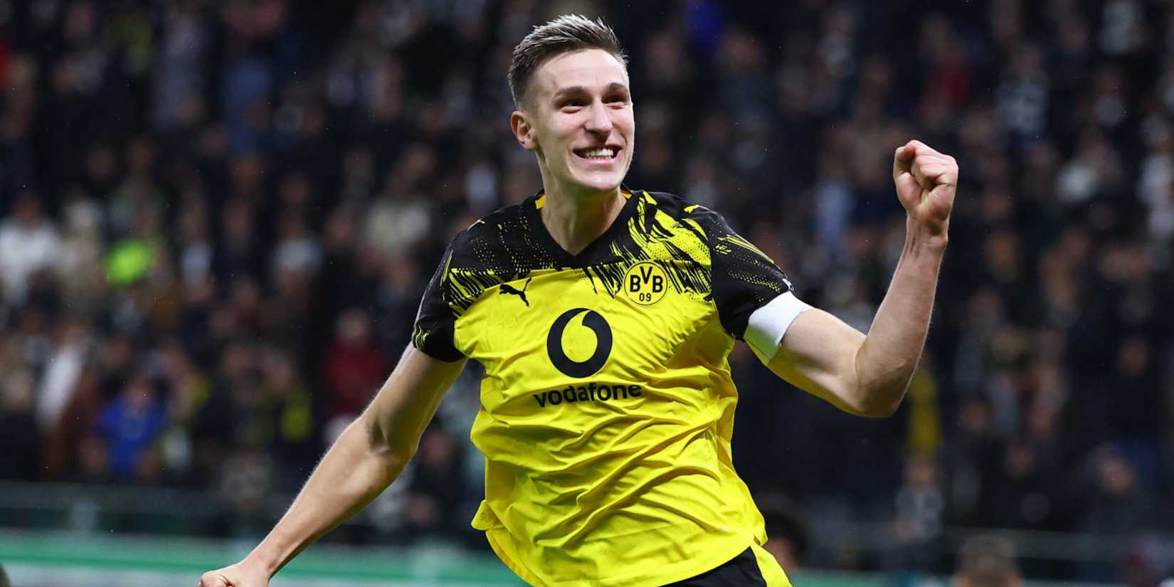 Nico Schlotterbeck celebrates after scoring for Borussia Dortmund