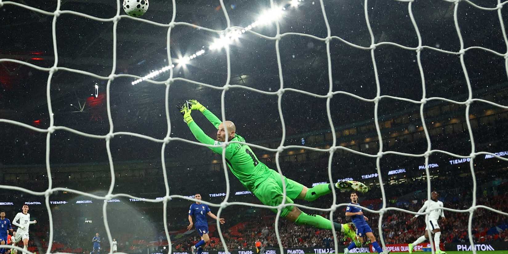 England's Eberechi Eze scores their second goal past Serbia's Predrag Rajkovic