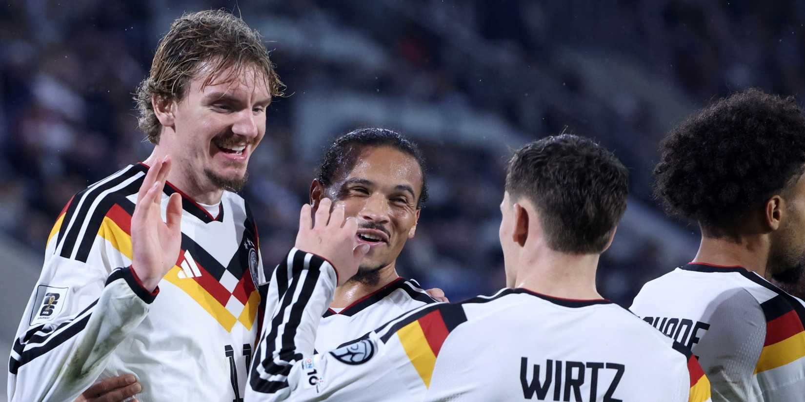 Germany's Nick Woltemade celebrates scoring their second goal with Leroy Sane and Florian Wirtz