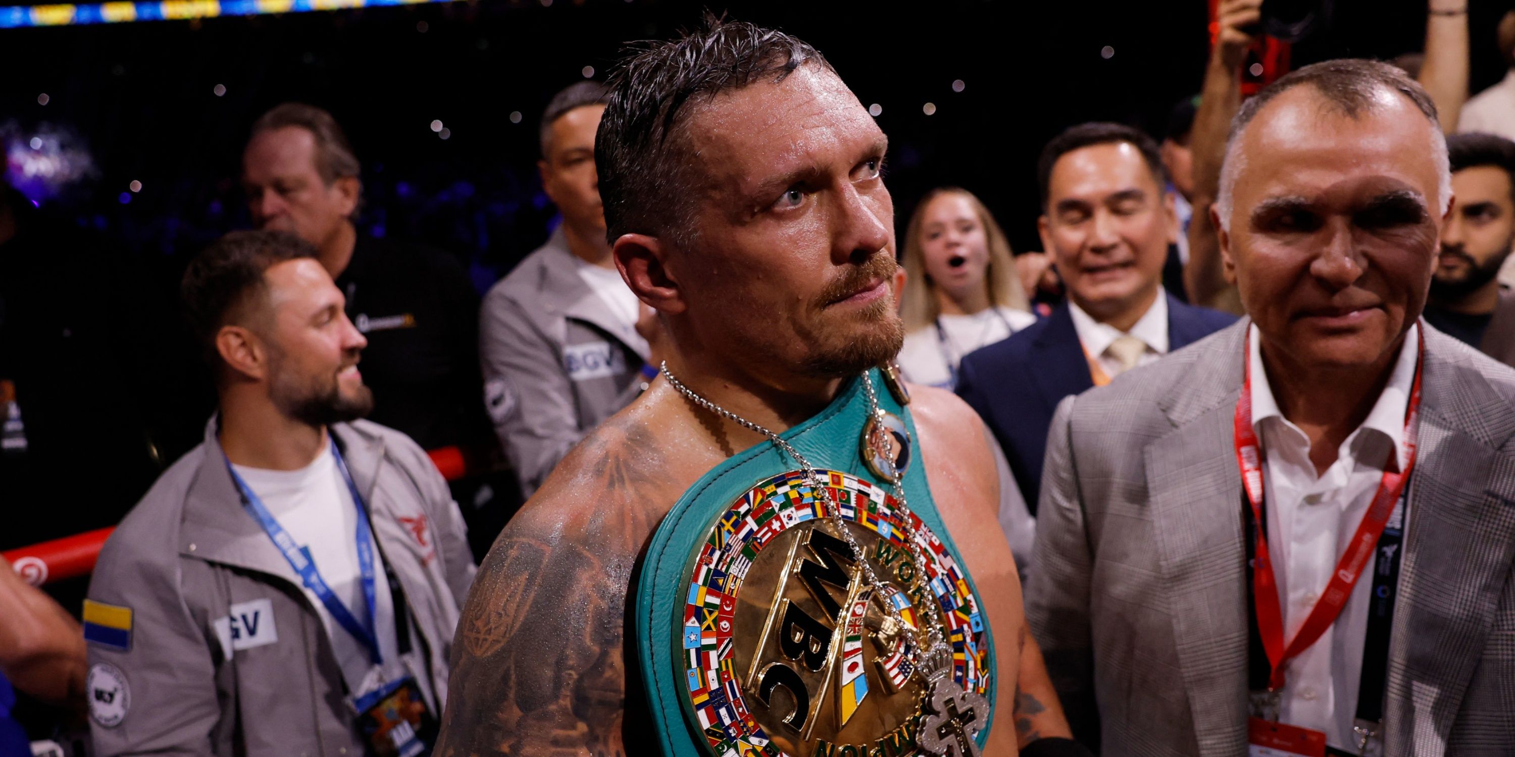 Oleksandr Usyk celebrates winning his fight against Daniel Dubois