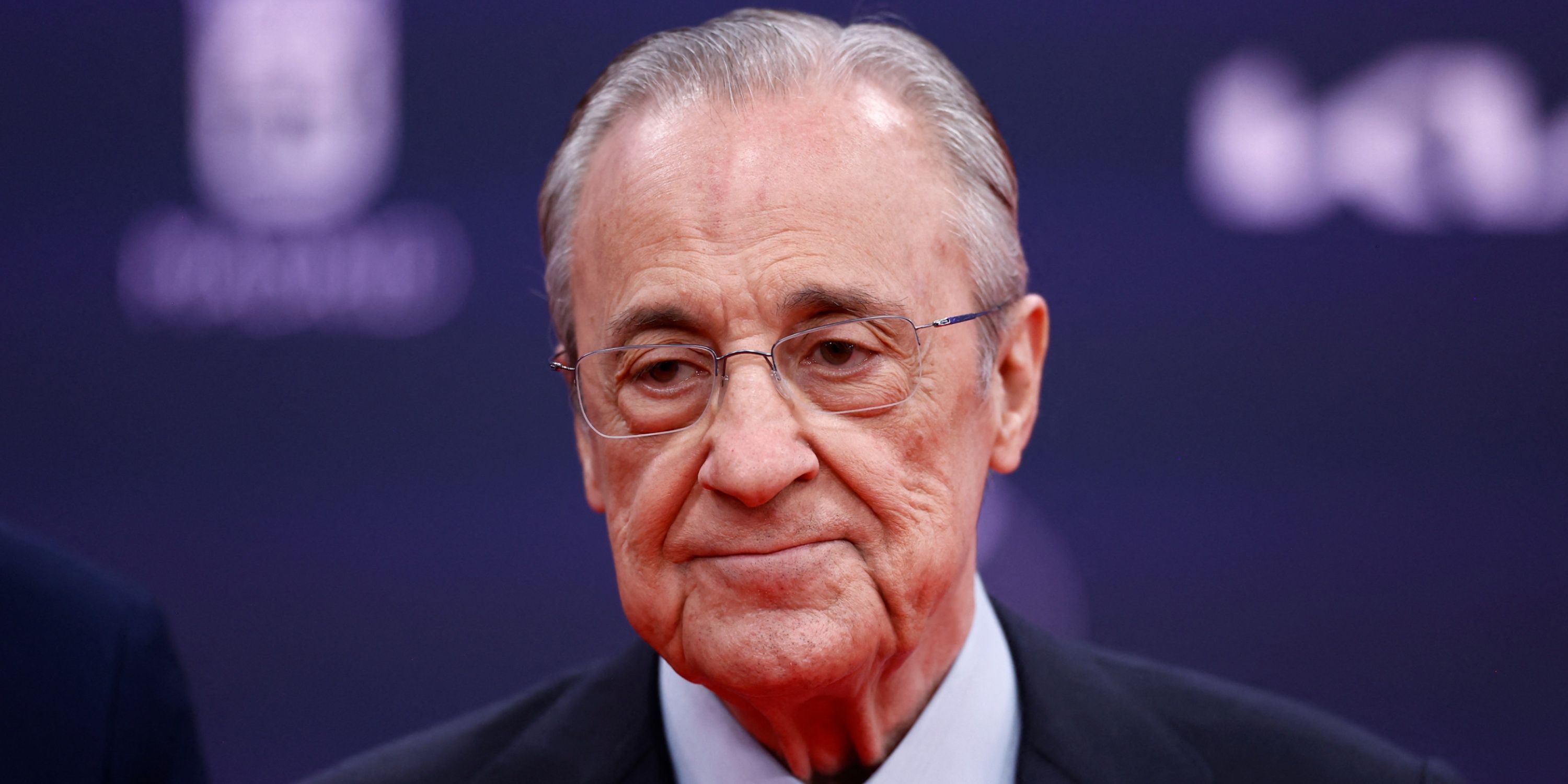 Real Madrid president Florentino Perez poses for pictures.