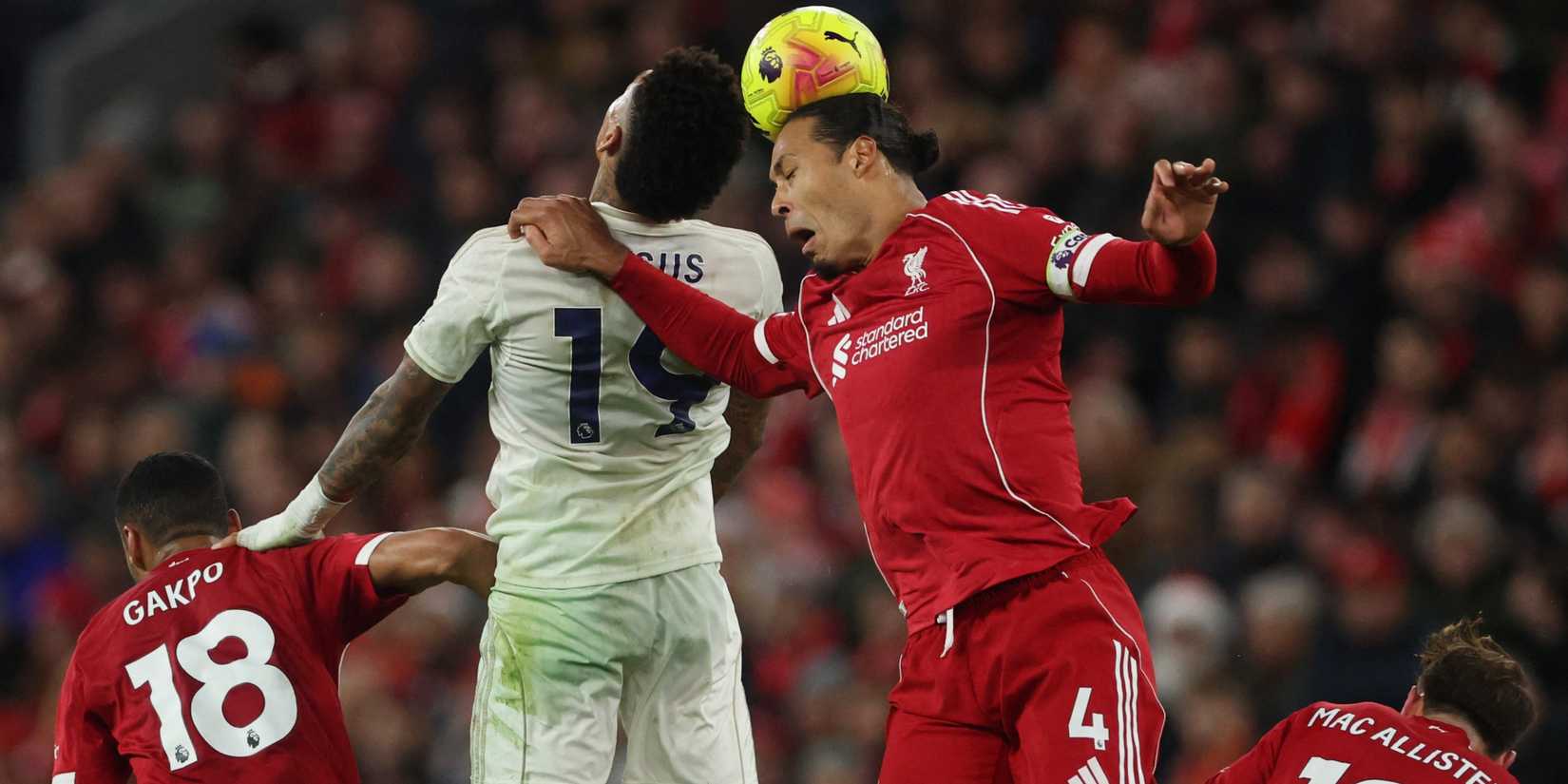 Nottingham Forest's Igor Jesus challenges Liverpool's Virgil van Dijk for a header.
