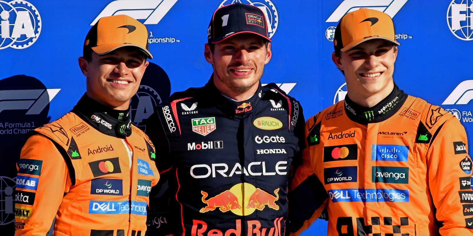Norris, Piastri and Max Verstappen posing