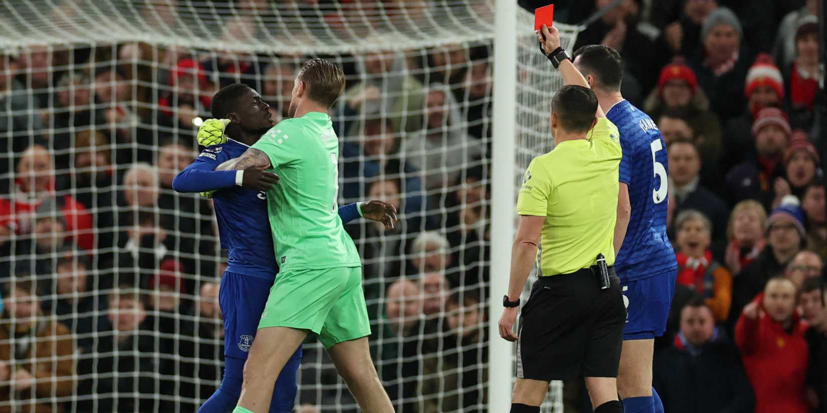  Everton's Idrissa Gueye is shown a red card