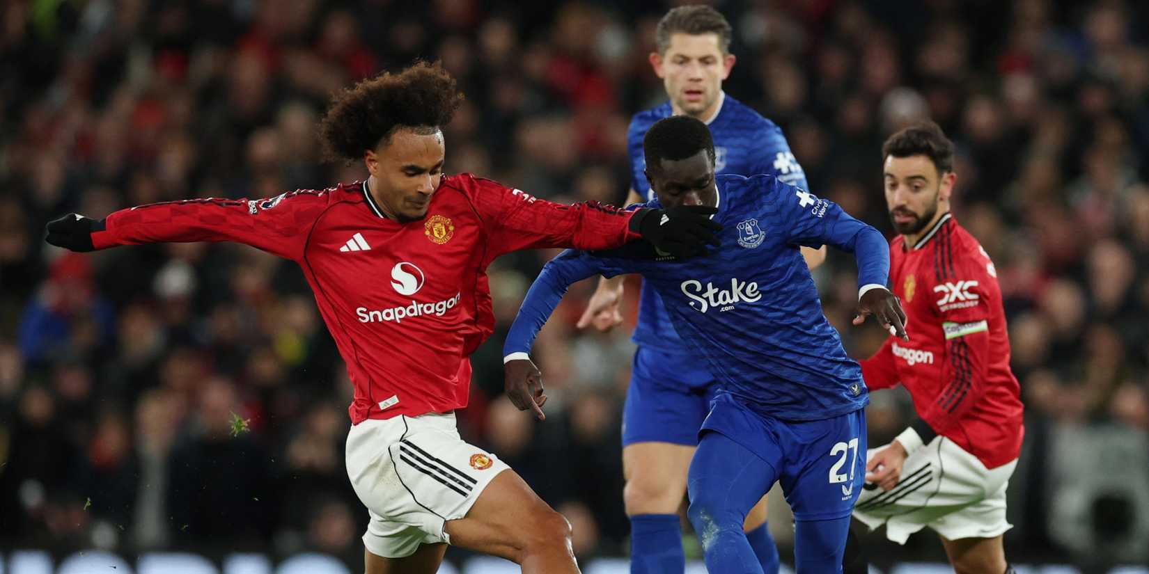 Everton's Idrissa Gueye in action with Manchester United's Joshua Zirkzee
