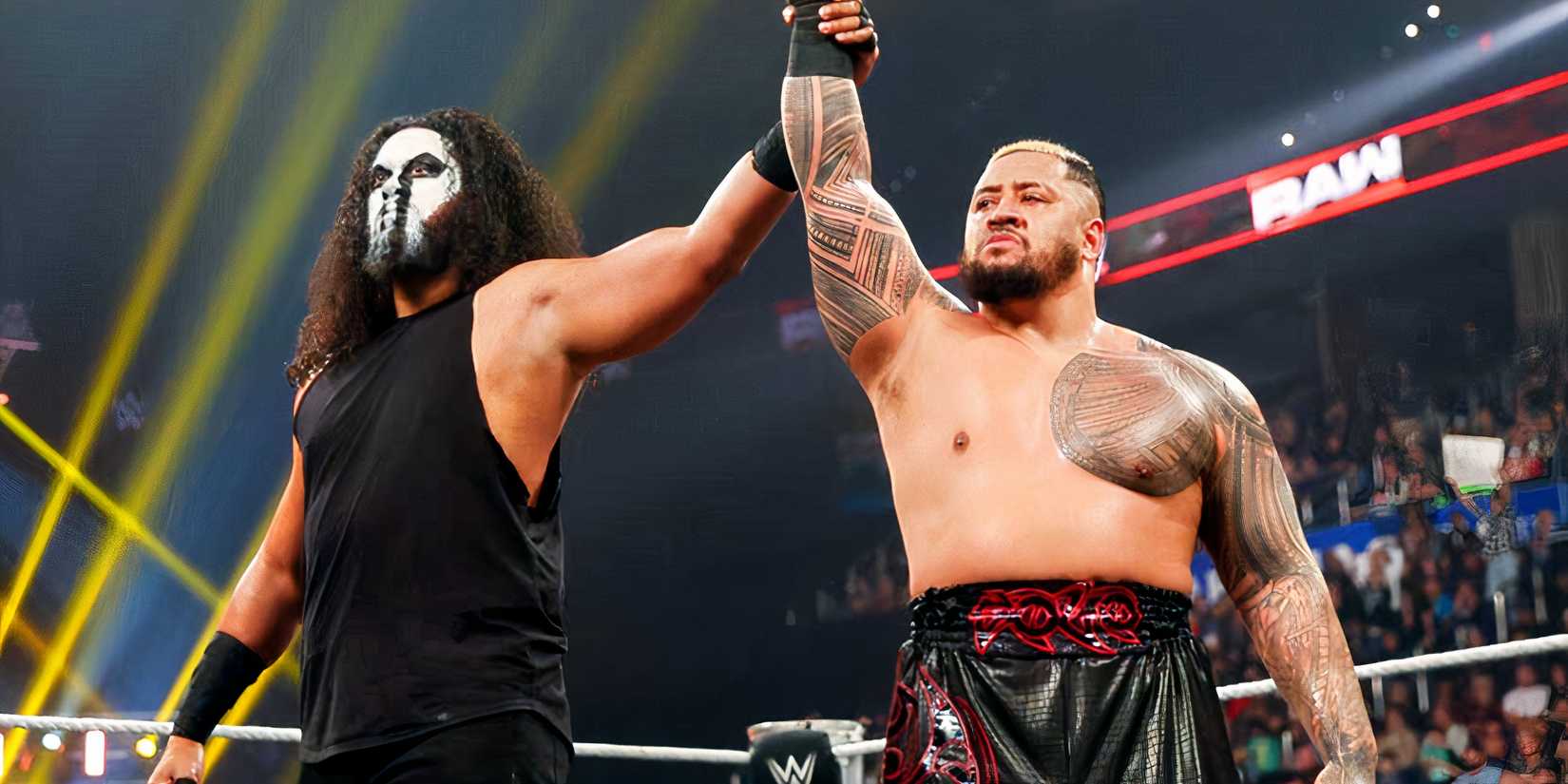 Solo Sikoa with his hand raised on WWE Raw