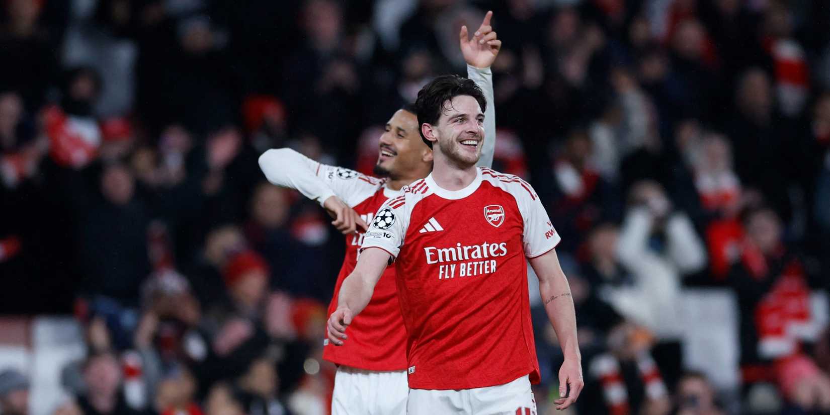 Arsenal's Declan Rice celebrates after the match with William Saliba