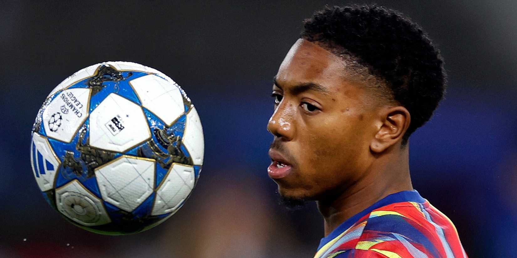 Arsenal's Myles Lewis-Skelly warms up.