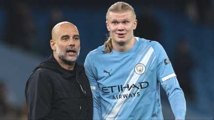Pep Guardiola and Erling Haaland