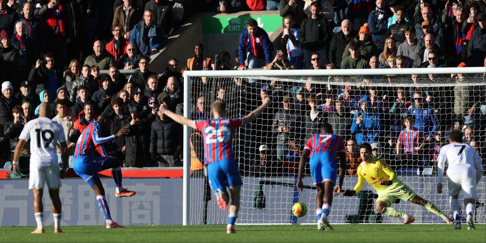 Crystal Palace's Jean-Philippe Mateta scores a penalty against Manchester United.