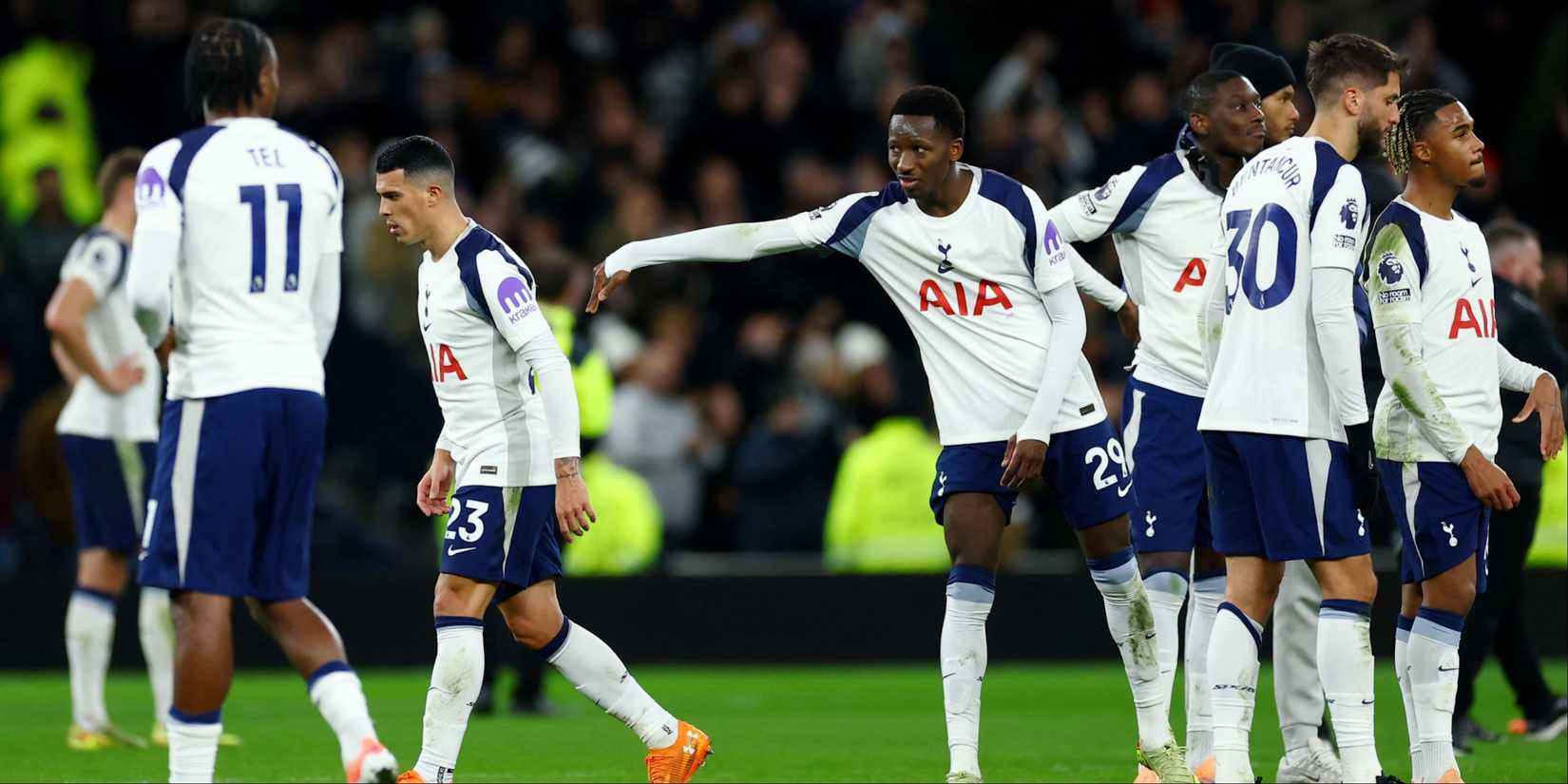 Tottenham Hotspur's Pedro Porro is pushed away by Pape Matar Sarr.