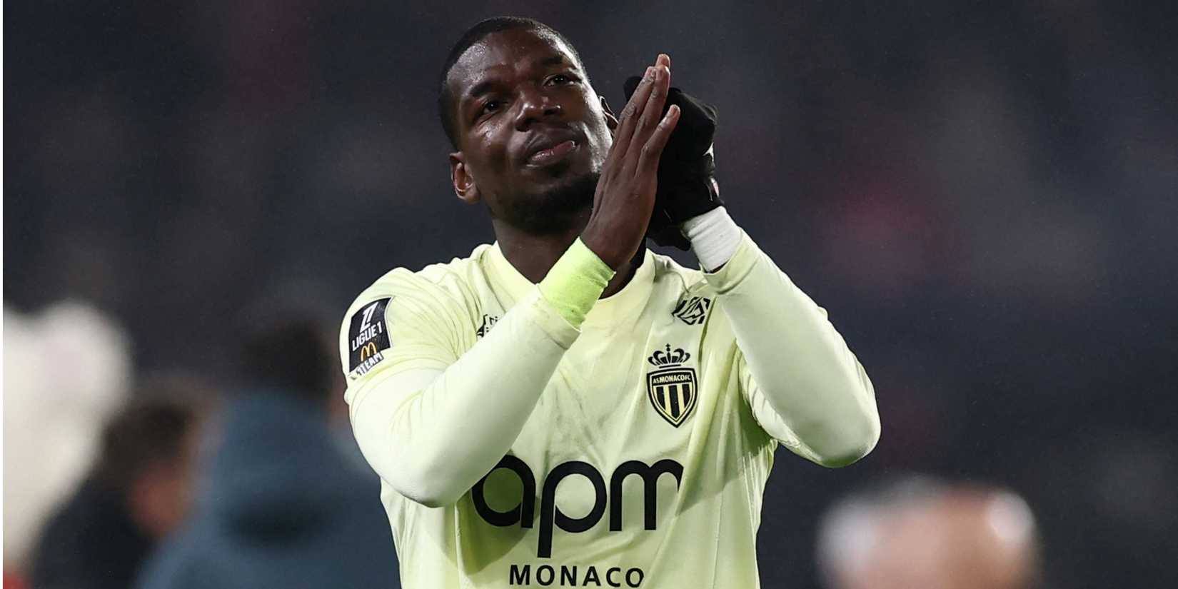 Paul Pogba applauds supporters after making his return to football