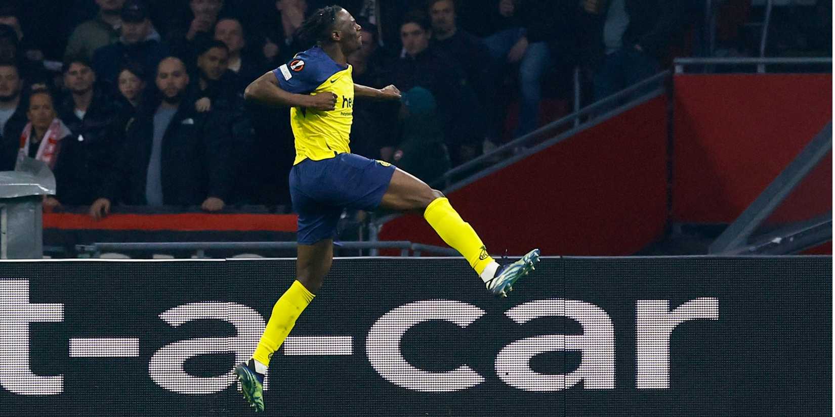 Promise David celebrates scoring against Ajax