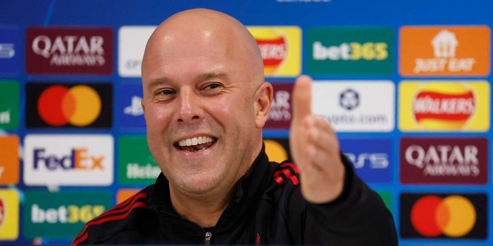 Arne Slot smiles during a Liverpool press conference