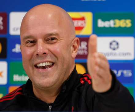 Arne Slot smiles during a Liverpool press conference