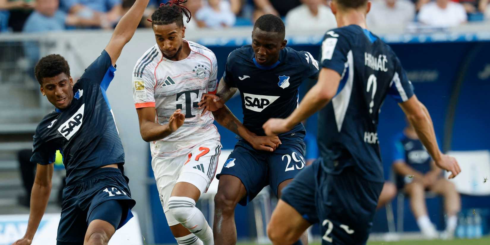 Hoffenheim defender Bazoumana Toure defends