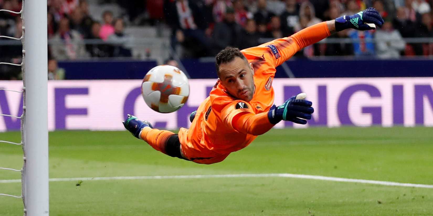 Arsenal's David Ospina diving for the ball.