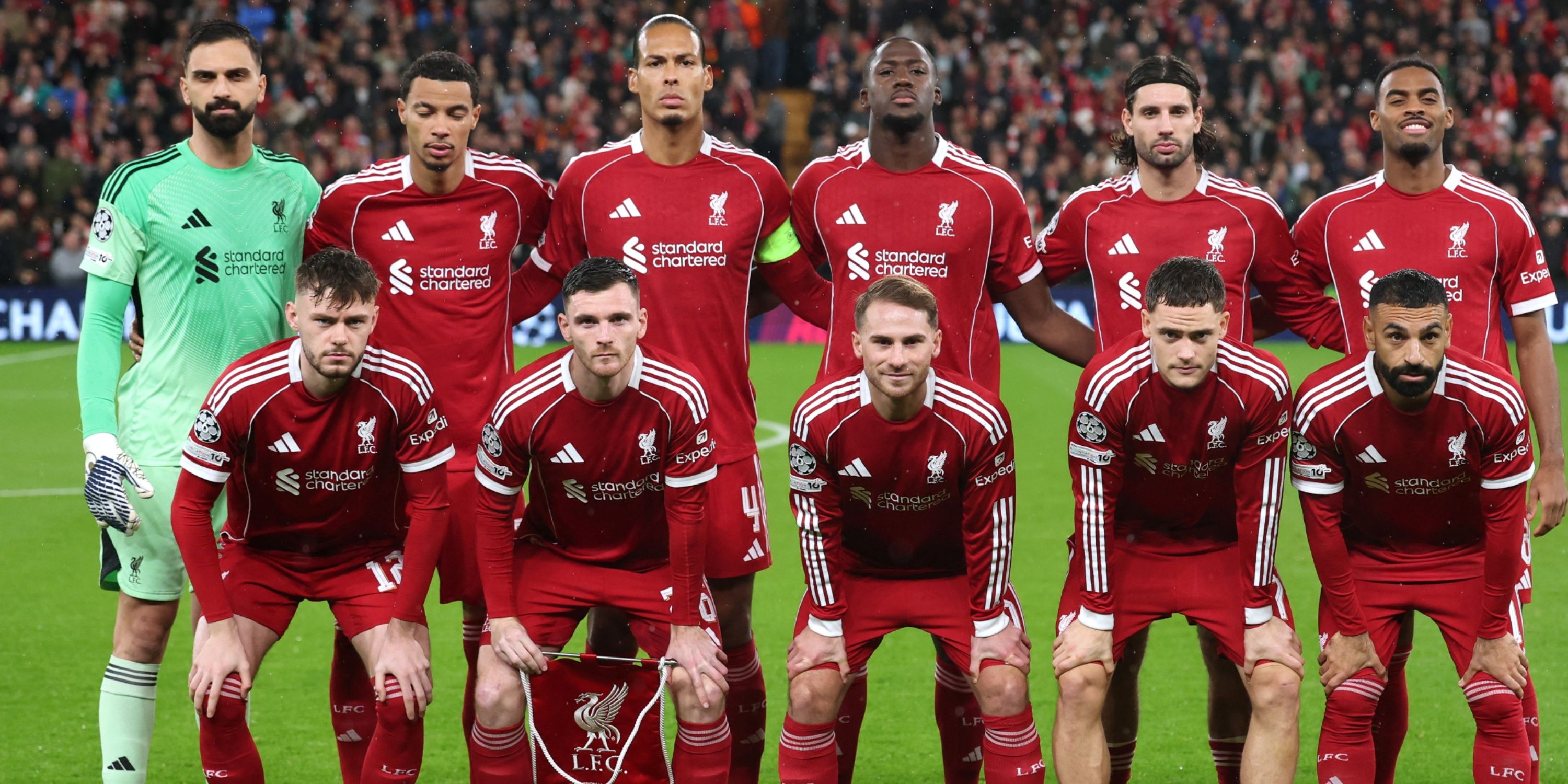 Liverpool players pose for a team group photo before playing Real Madrid