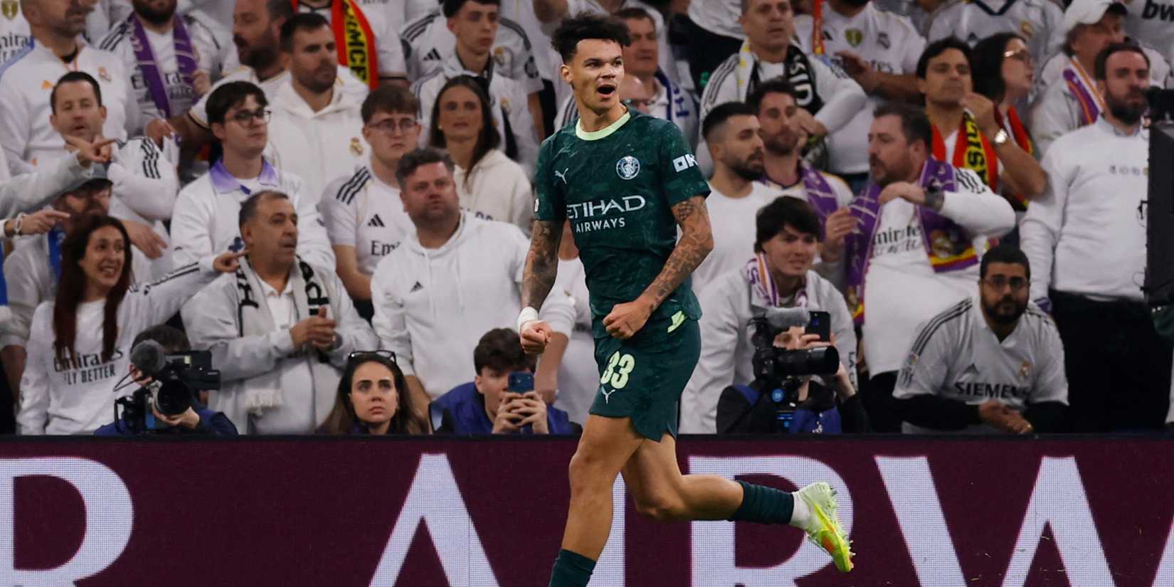 Manchester City's Nico O'Reilly celebrates in front of Real Madrid fans.
