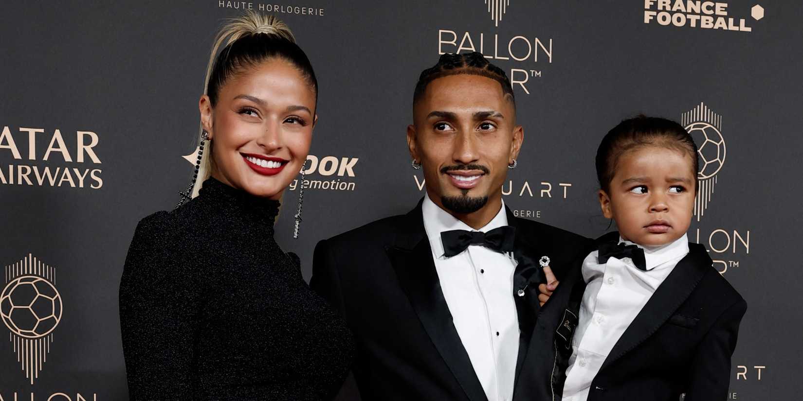  FC Barcelona's Raphinha, his partner Natalia Rodrigues Belloli and child pose for photo