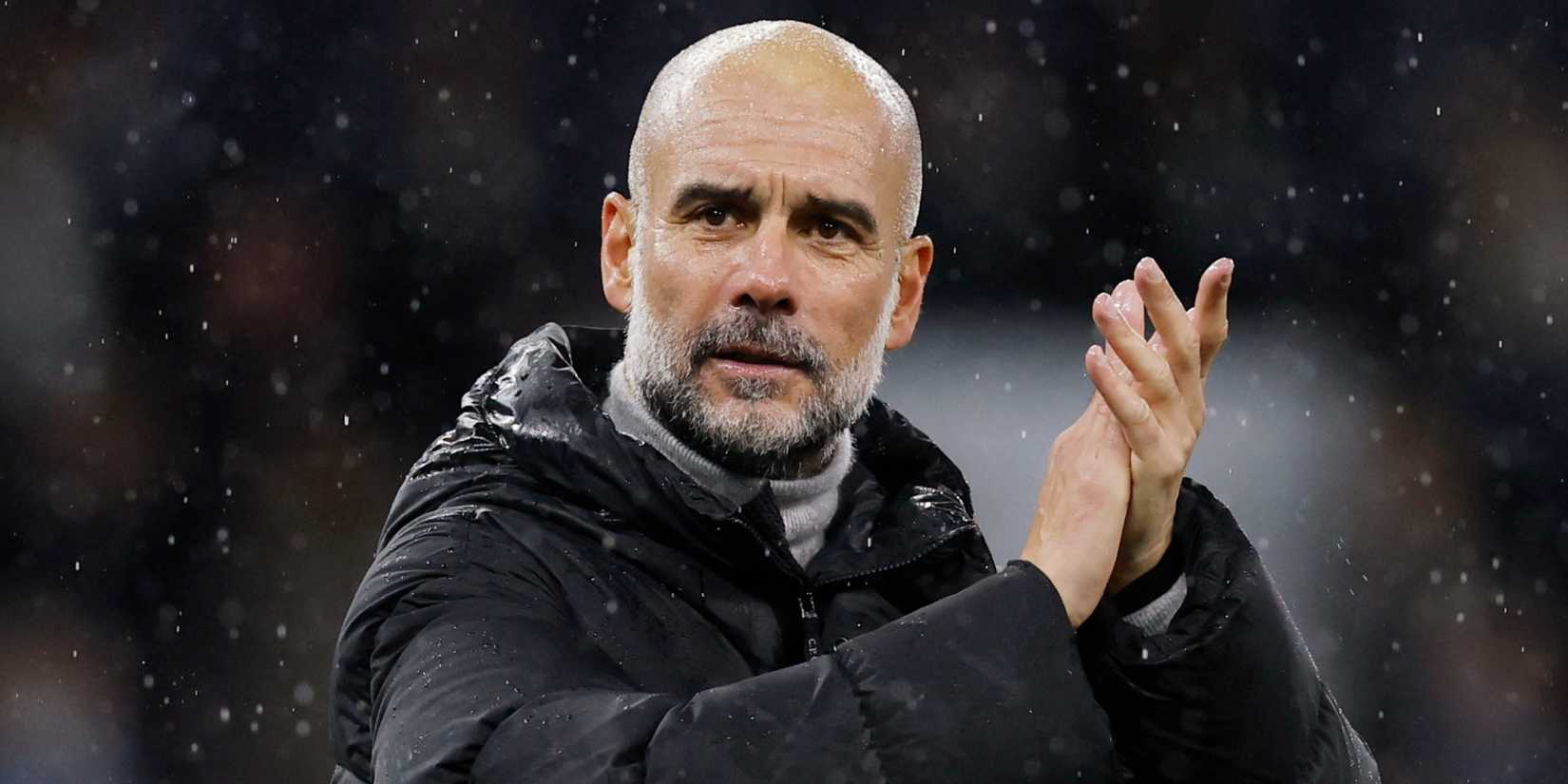 Manchester City manager Pep Guardiola applauds.