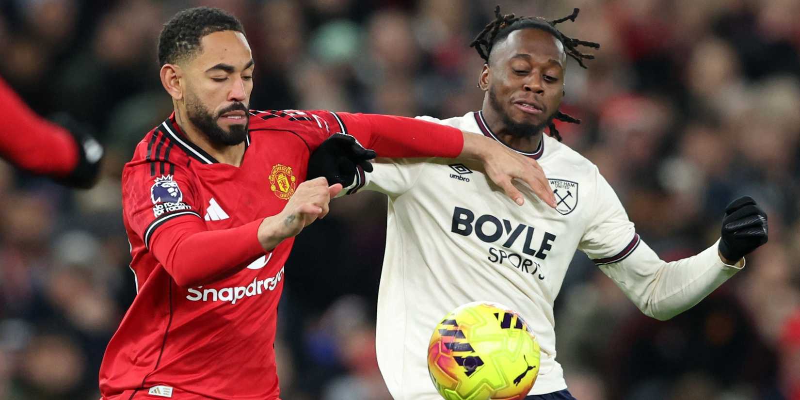 Manchester United's Matheus Cunha in action with West Ham United's Aaron Wan-Bissaka