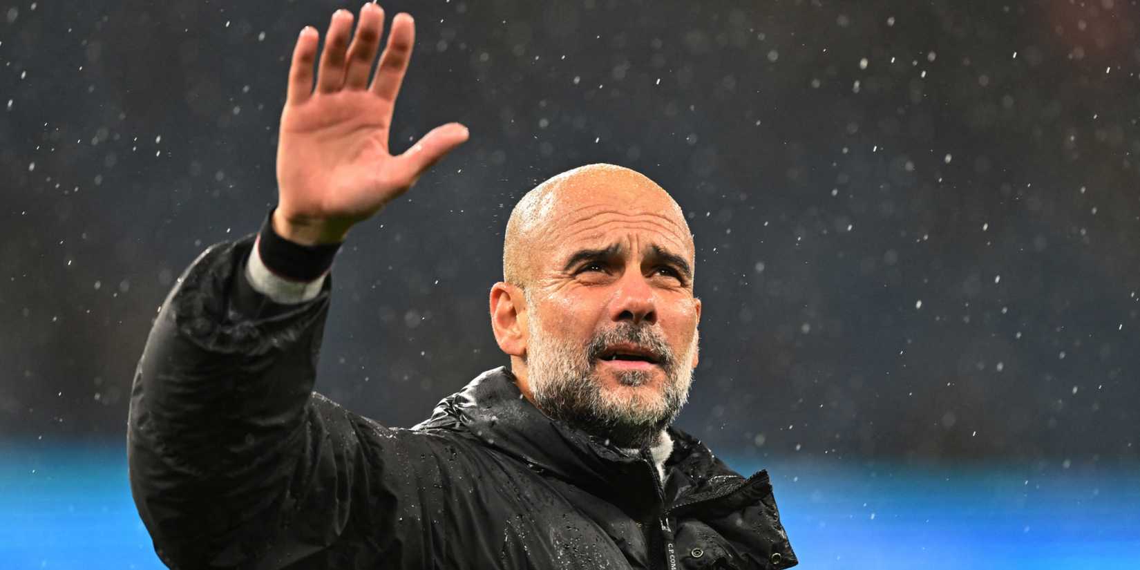 Manchester City manager Pep Guardiola waving