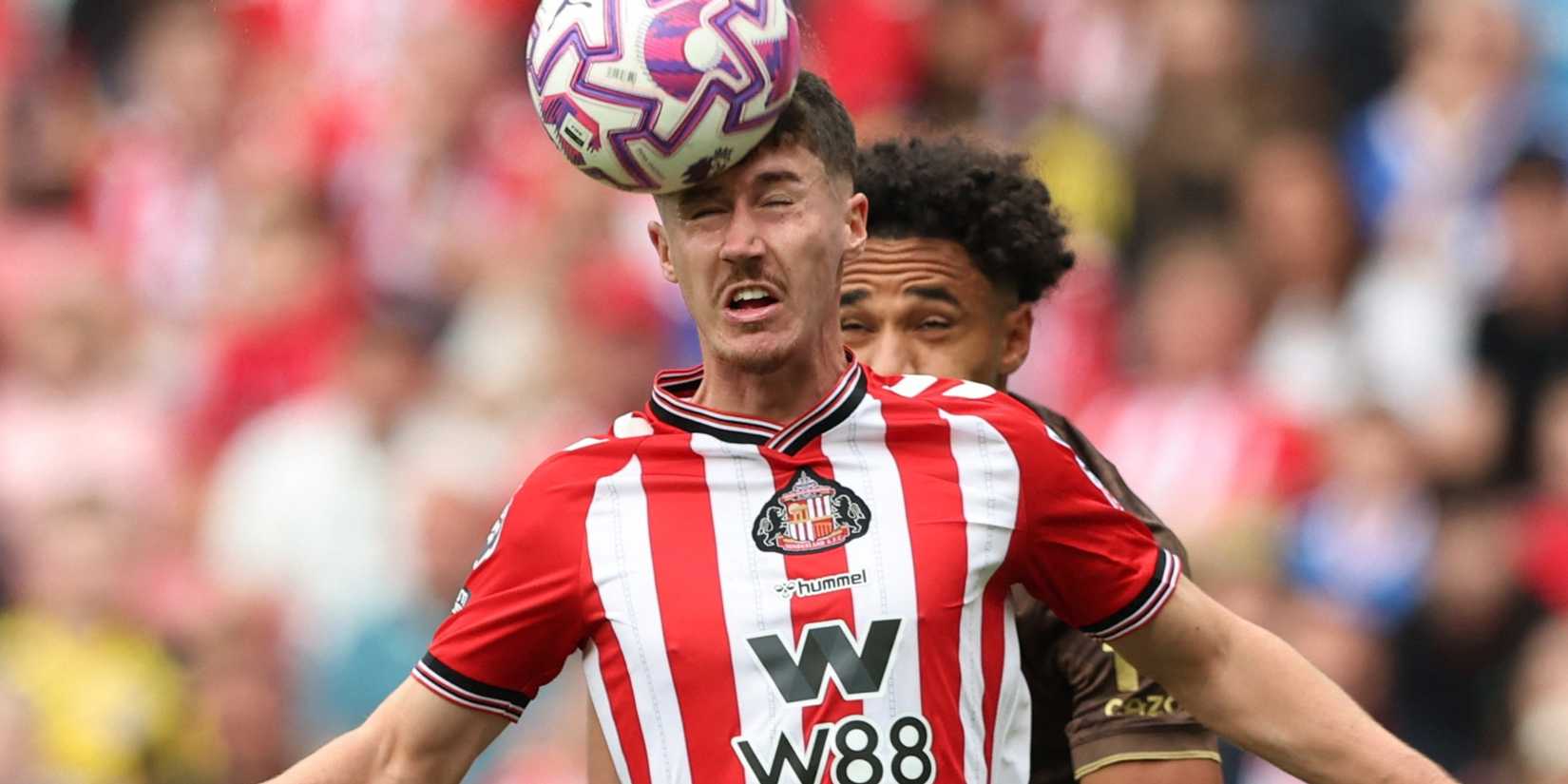 Sunderland's Trai Hume heads the ball