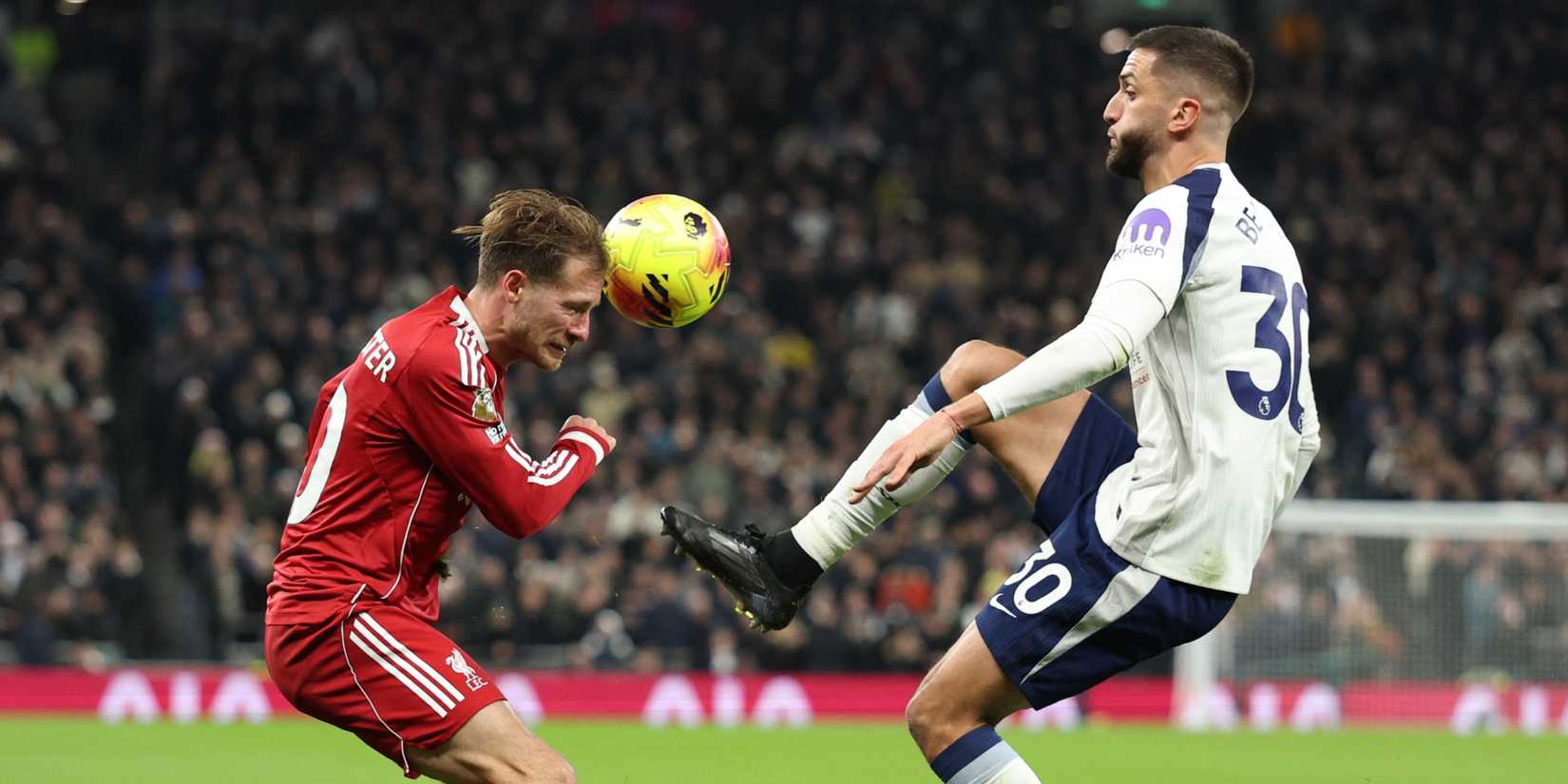 Tottenham Hotspur's Rodrigo Bentancur in action with Liverpool's Alexis Mac Allister