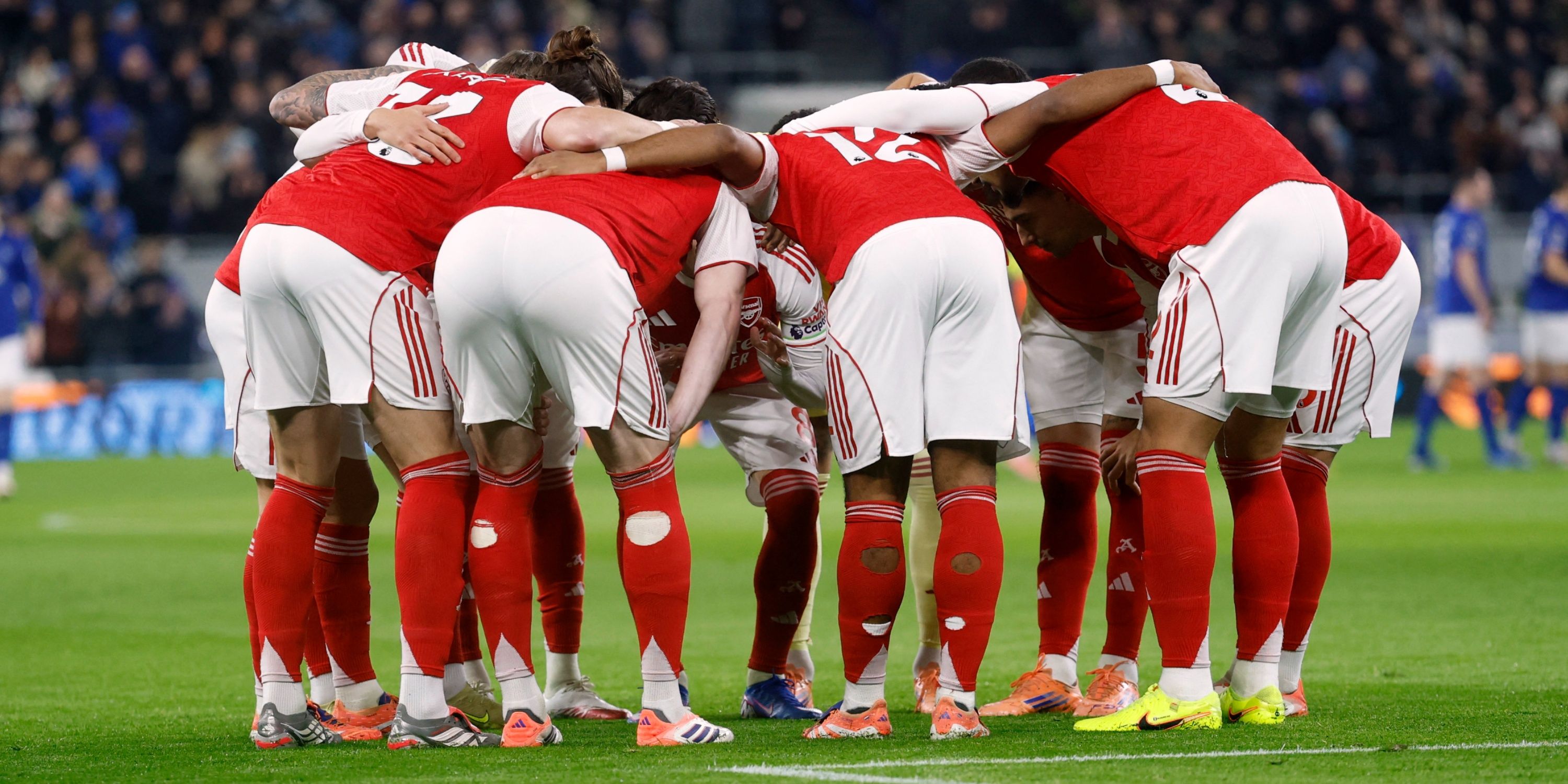 Arsenal players in a huddle
