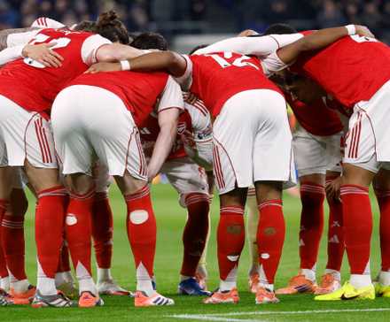 Arsenal players in a huddle