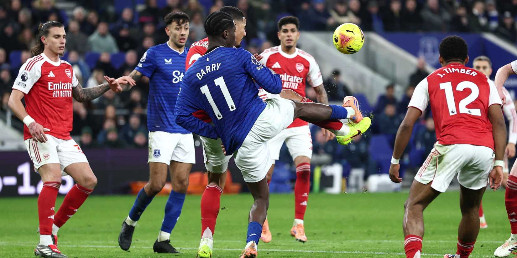 Arsenal's William Saliba in action with Everton's Thierno Barry