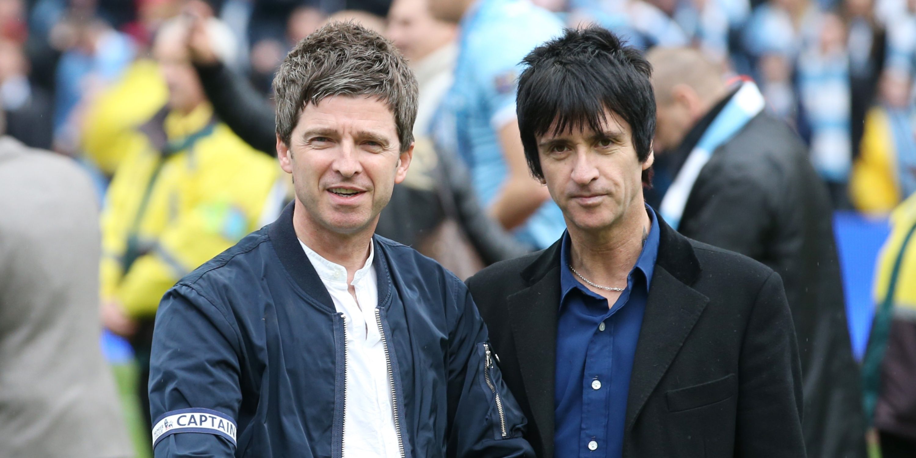 Noel Gallagher and Johnny Marr at Manchester City