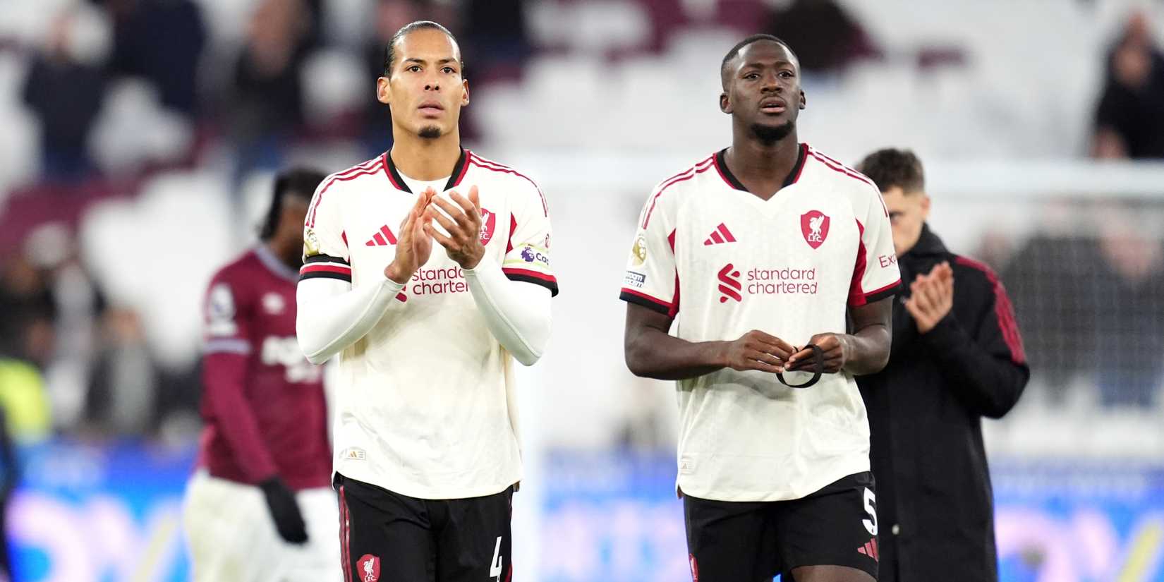 Liverpool's Virgil van Dijk (left) and Ibrahima Konate applaud the fans