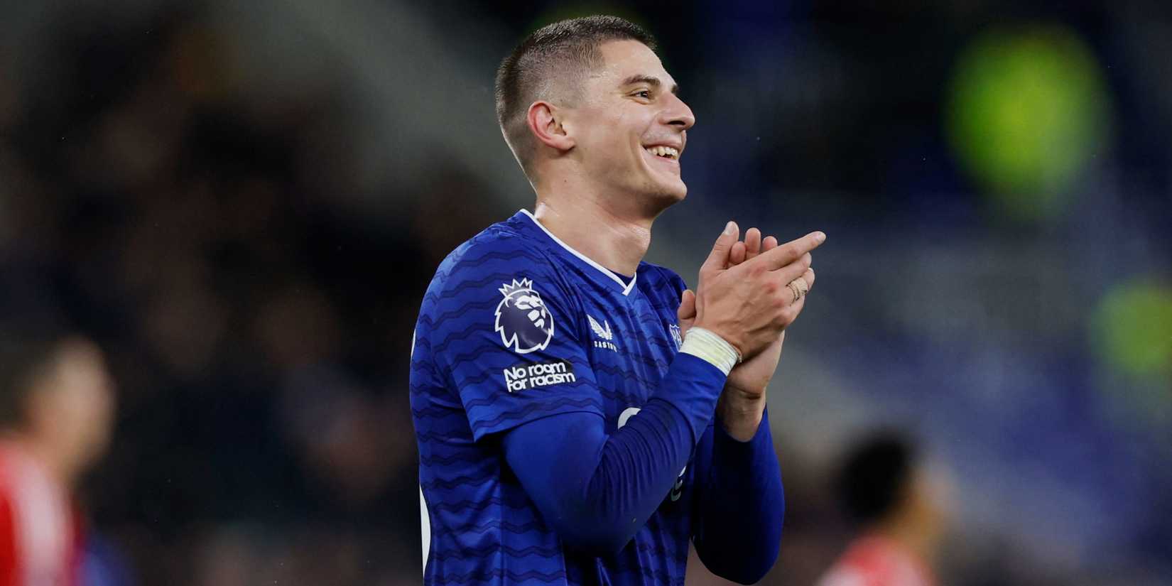 Everton's Vitaliy Mykolenko celebrating