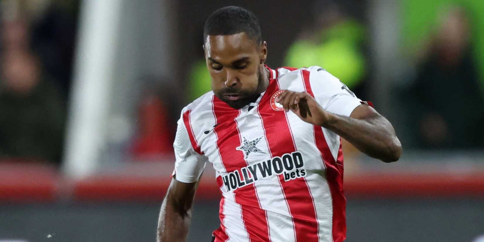 Brentford's Rico Henry dribbling with the ball