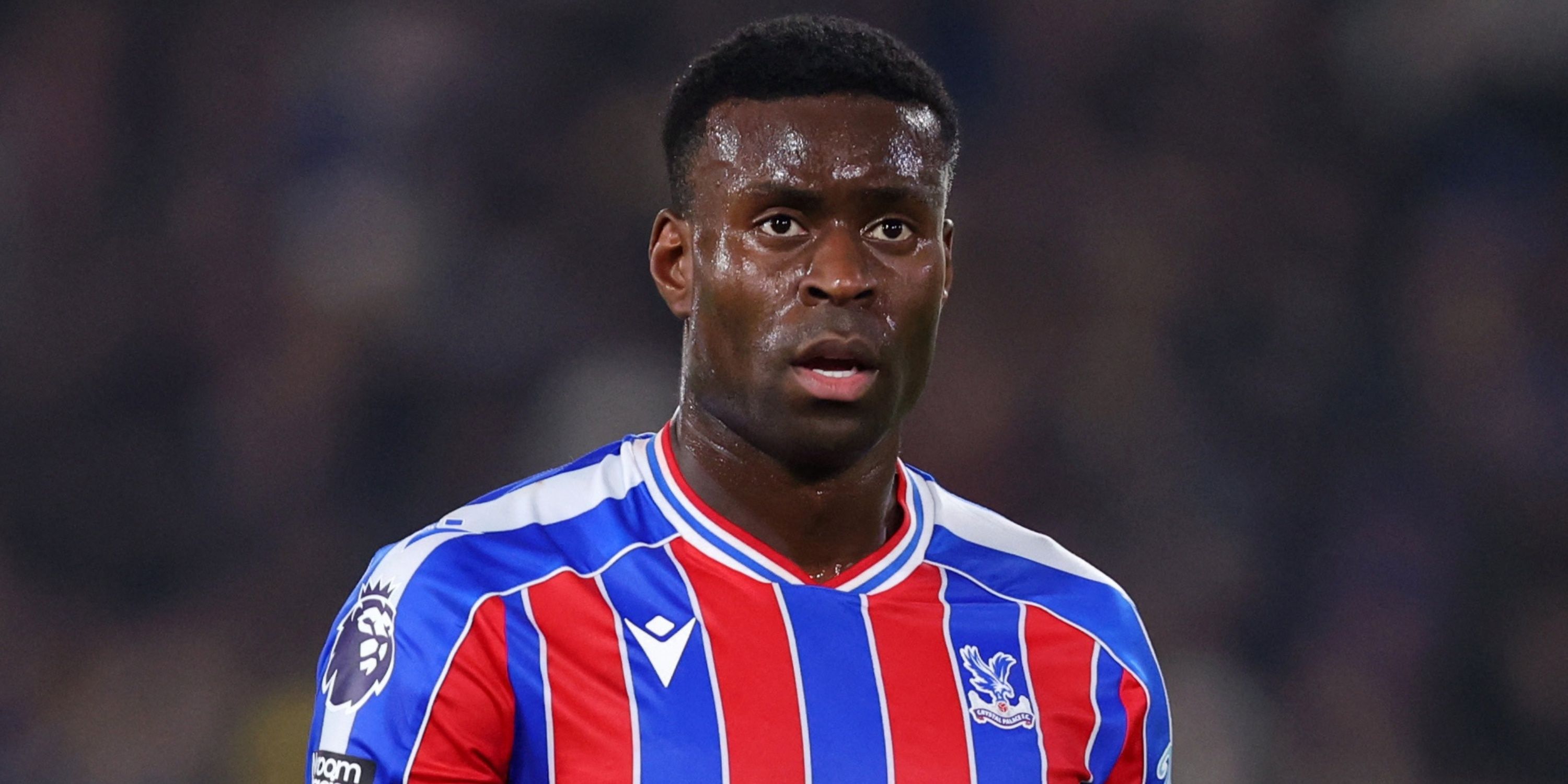 Crystal Palace's Marc Guehi staring.