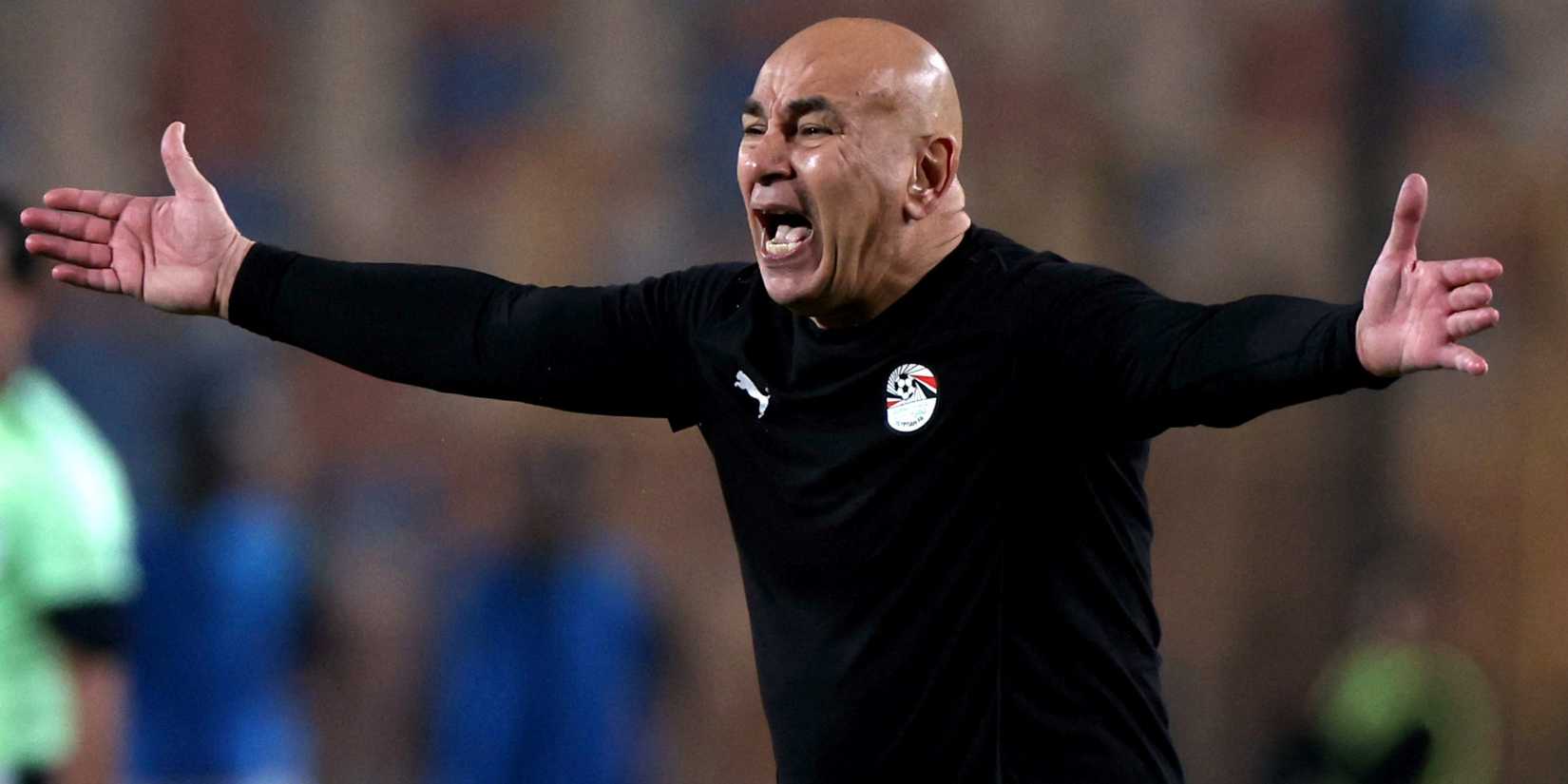 Egypt coach Hossam Hassan holds his hands up