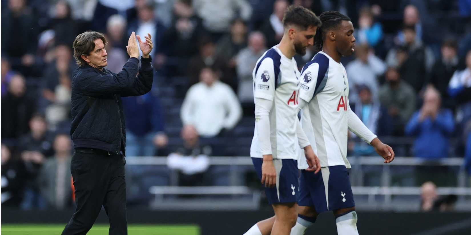 Thomas Frank applauds supporters as he walks off the pitch