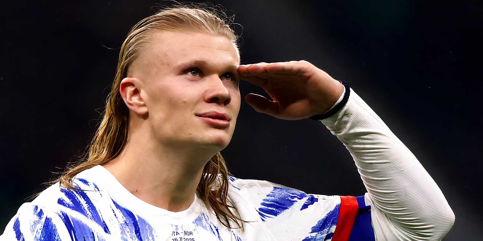 Erling Haaland salutes the crowd