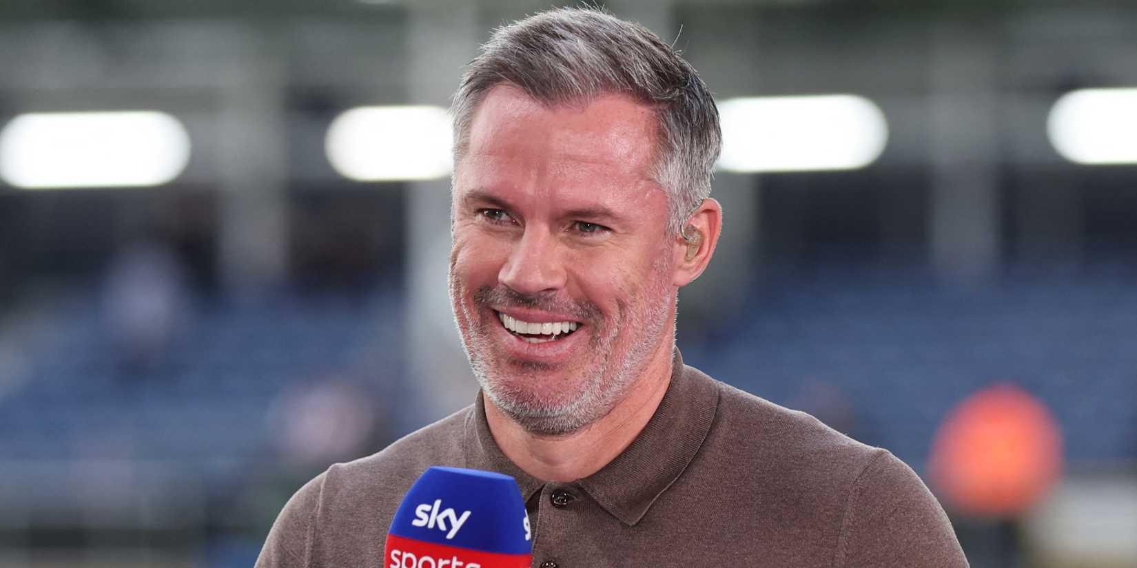 Jamie Carragher performing media duties