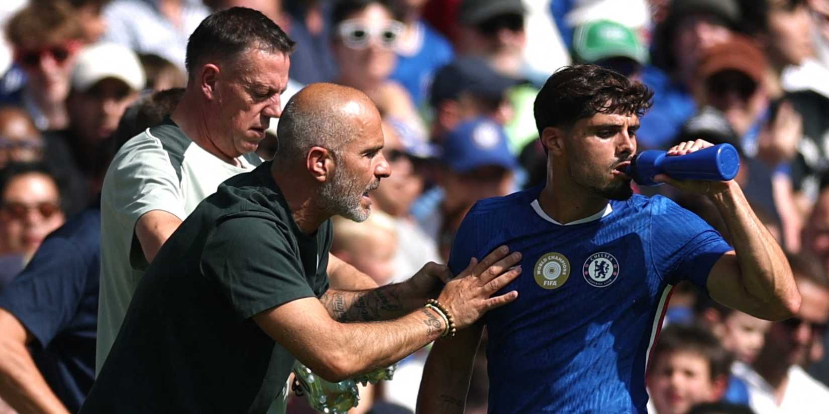 Chelsea manager Enzo Maresca talks to Pedro Neto