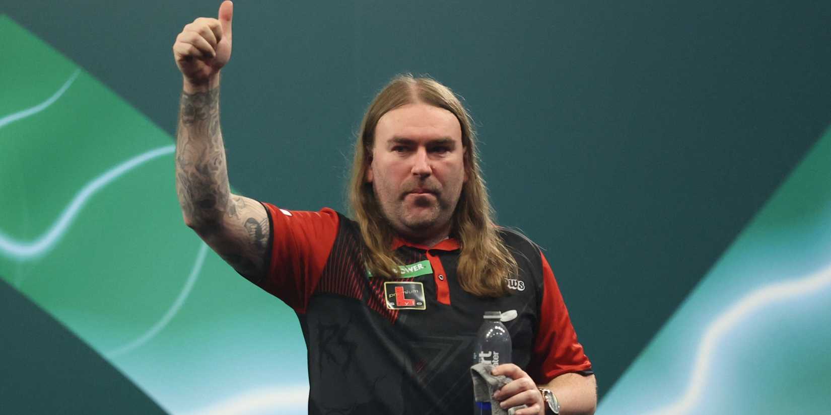 Ryan Searle celebrates winning his quarter final match against Jonny Clayton