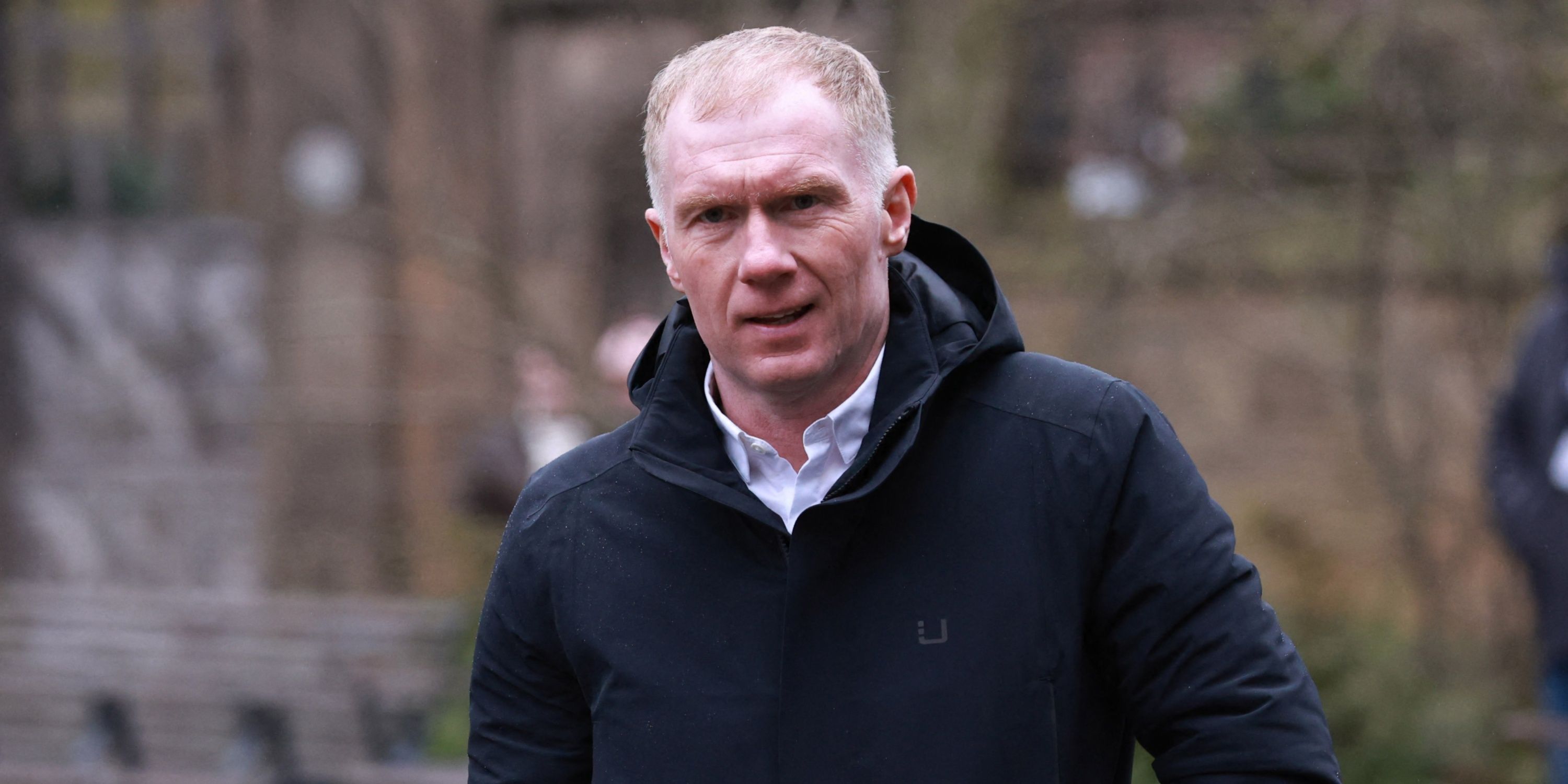 Paul Scholes arrives to attend the funeral of Denis Law